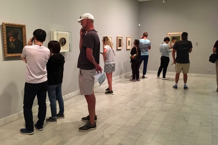 people looking at art in Picasso Museum